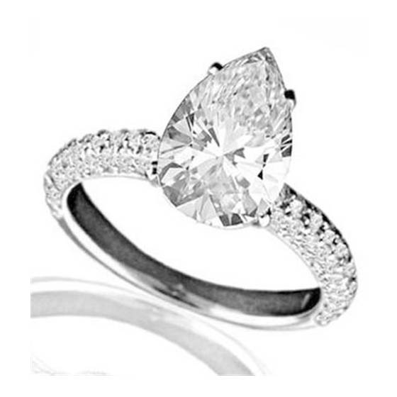 0.75ct SI2/G Pear and Round Diamond Vintage Ring