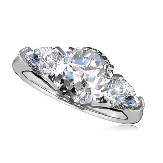 0.50ct SI2/G Round and Pear Diamond Trilogy Ring