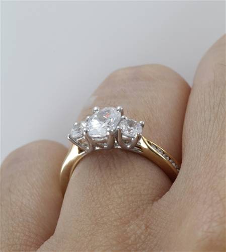 3 Stone Oval Diamond Ring With Shoulder Diamonds Image