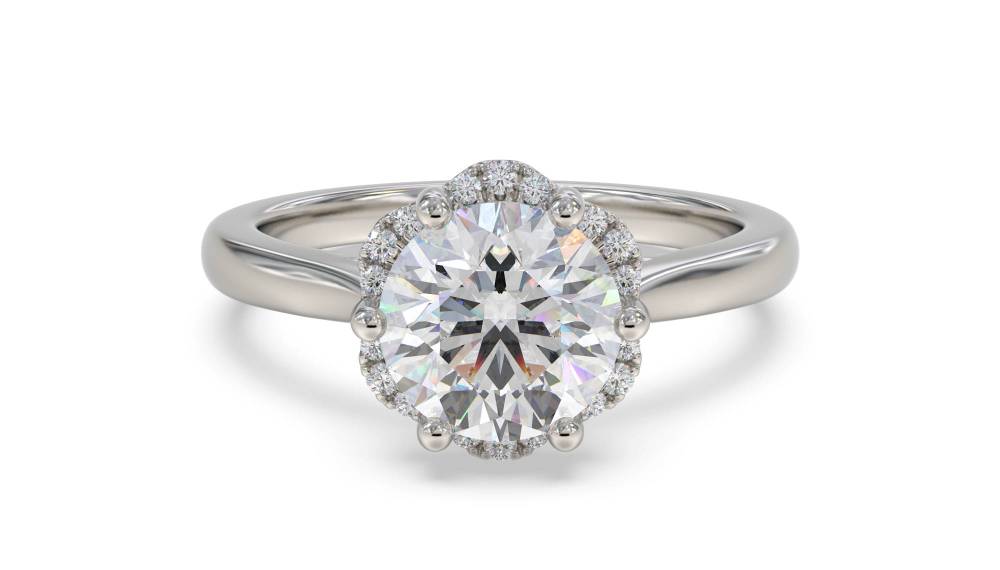 Modern Side Halo Round Diamond Engagement Ring set in Platinum