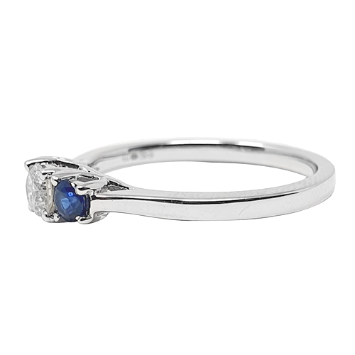 Modern Round Diamond & Blue Sapphire Trilogy Ring Image