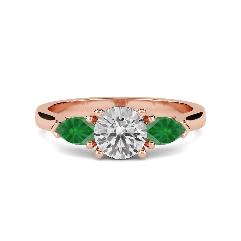 Diamond Centre And Emerald Side Trilogy Ring Image