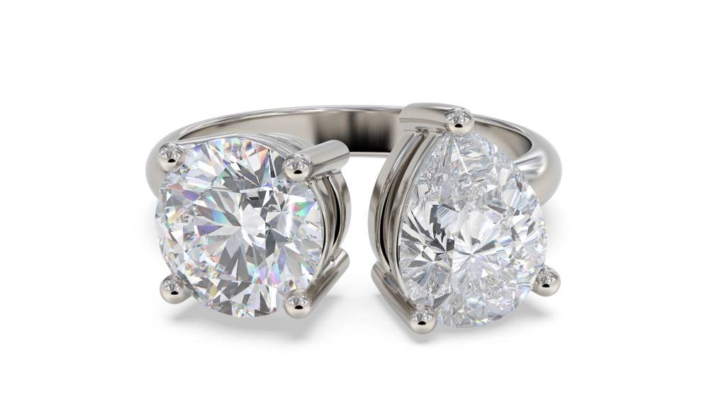 Round & Pear Two Stone Diamond Ring set in Platinum