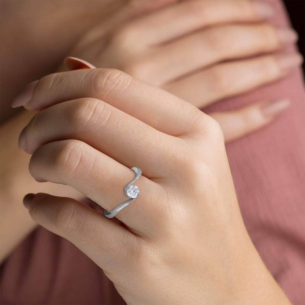 Twist Round Diamond Solitaire Ring P