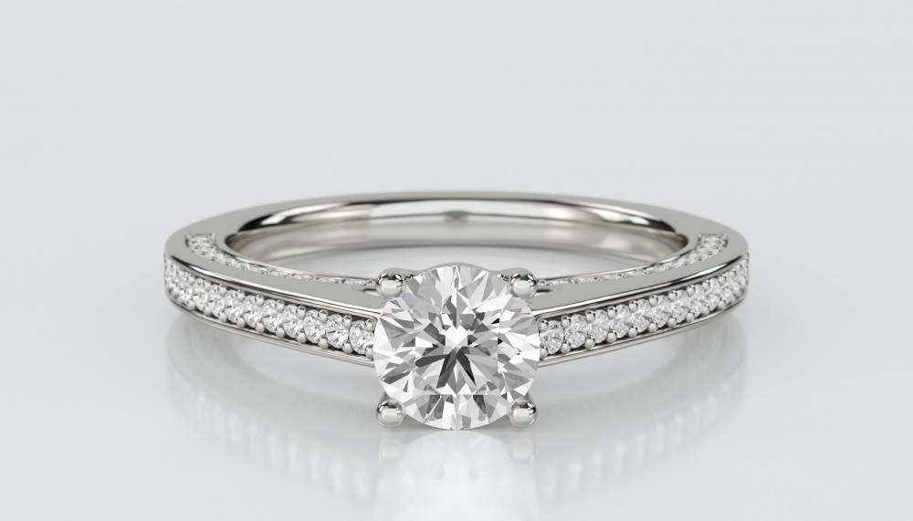 Unique Round Diamond Engagement Ring set in Platinum