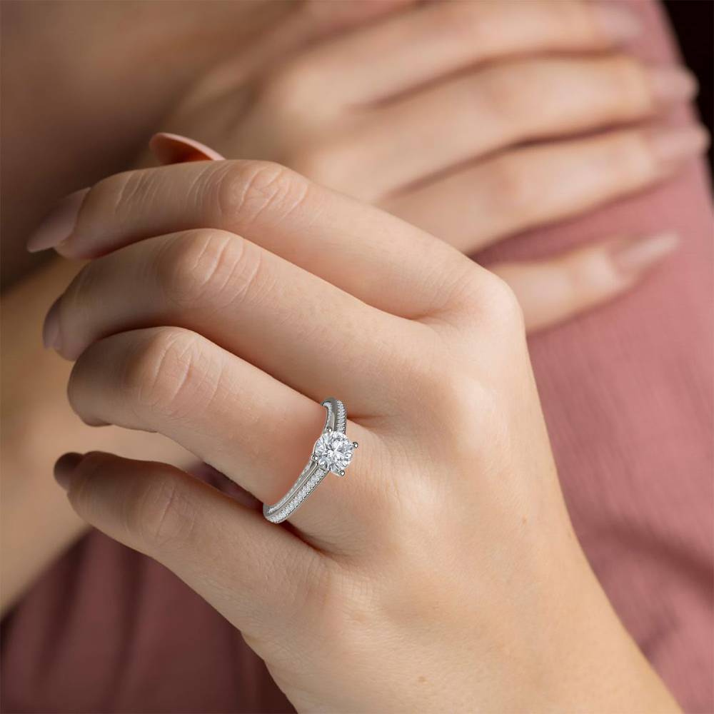 Unique Round Diamond Engagement Ring set in Platinum