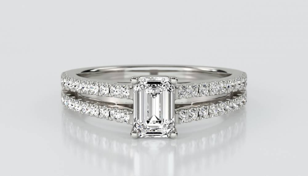 Emerald Diamond Split Shoulder Engagement Ring set in Platinum