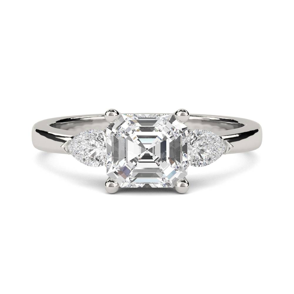 Elegant Asscher & Pear Diamond Trilogy Ring set in Platinum