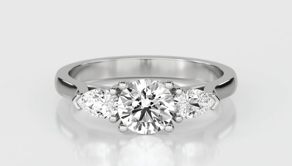 Elegant Round & Pear Diamond Trilogy Ring W