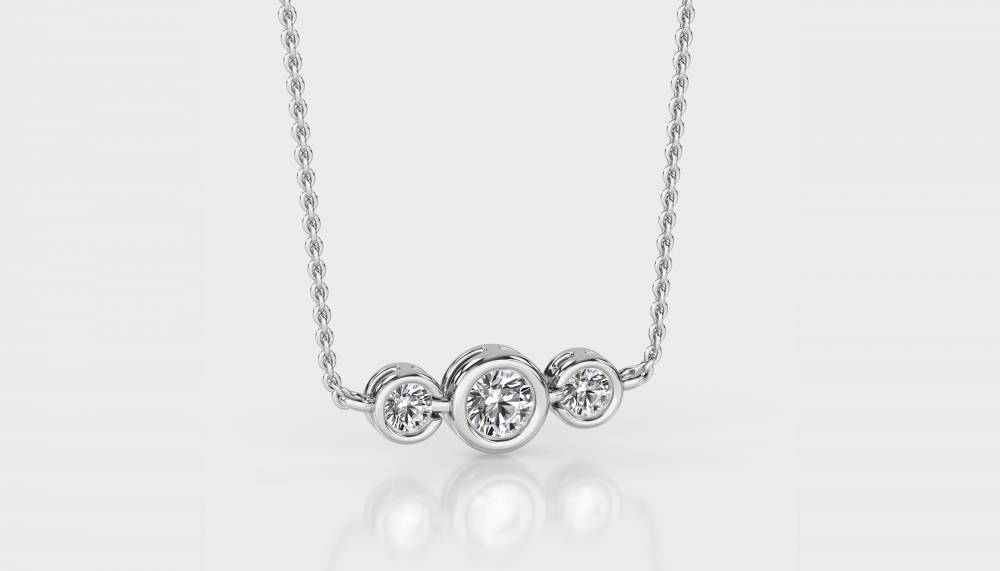 Three Stone Diamond Necklace set in White Gold